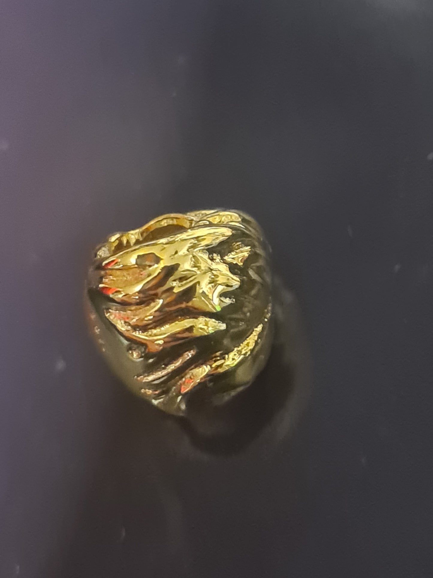 Gold mufasa charm