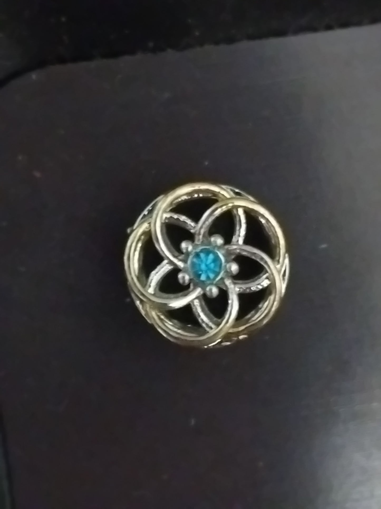 Flower charm blue gem