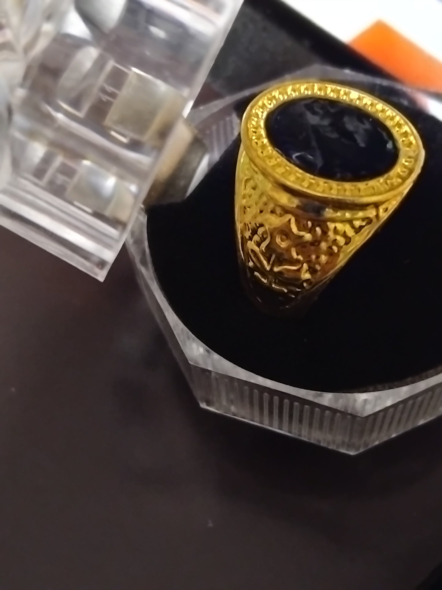 Black and gold centre peace signit rings