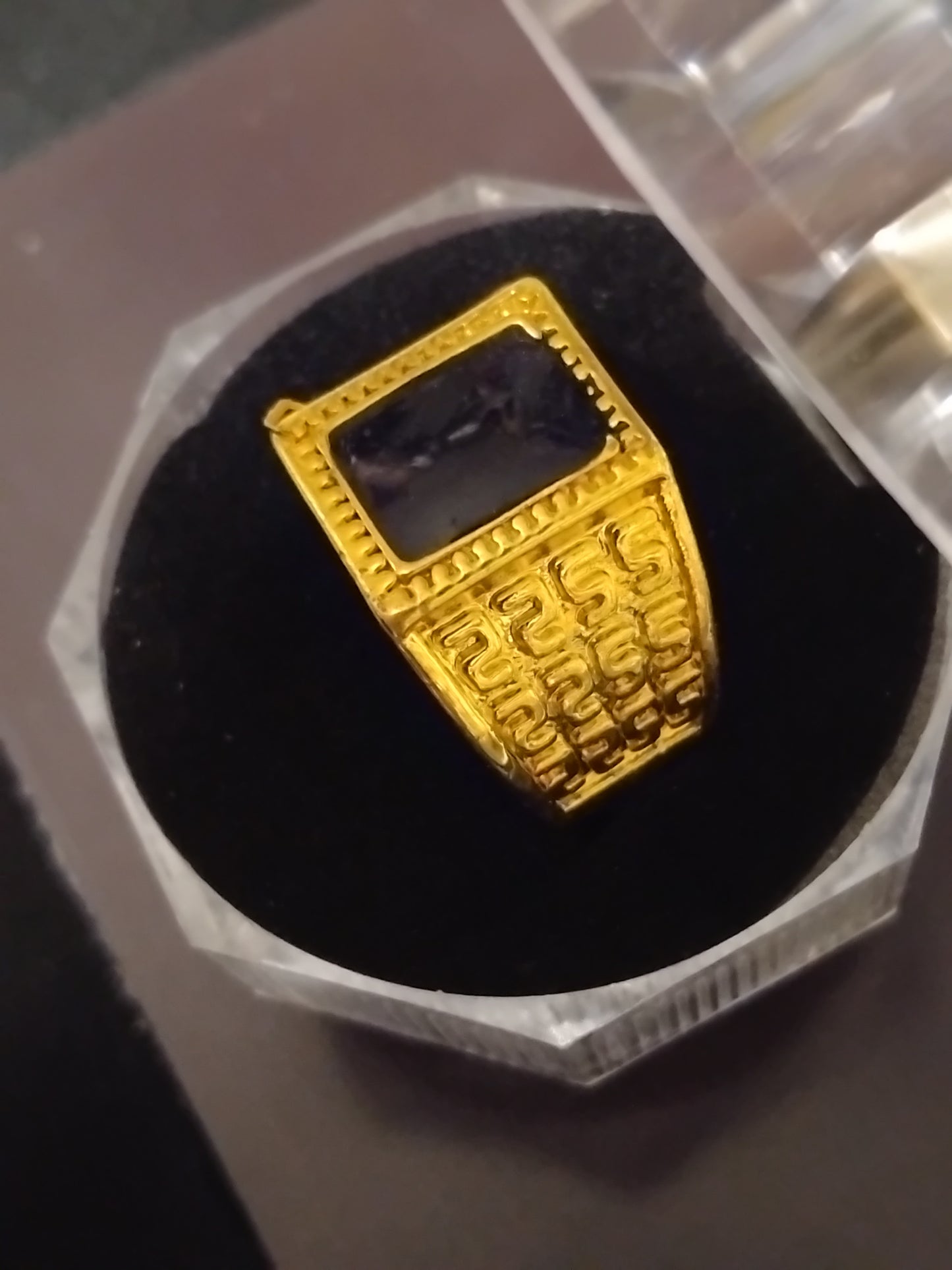 Black and gold centre peace signit rings