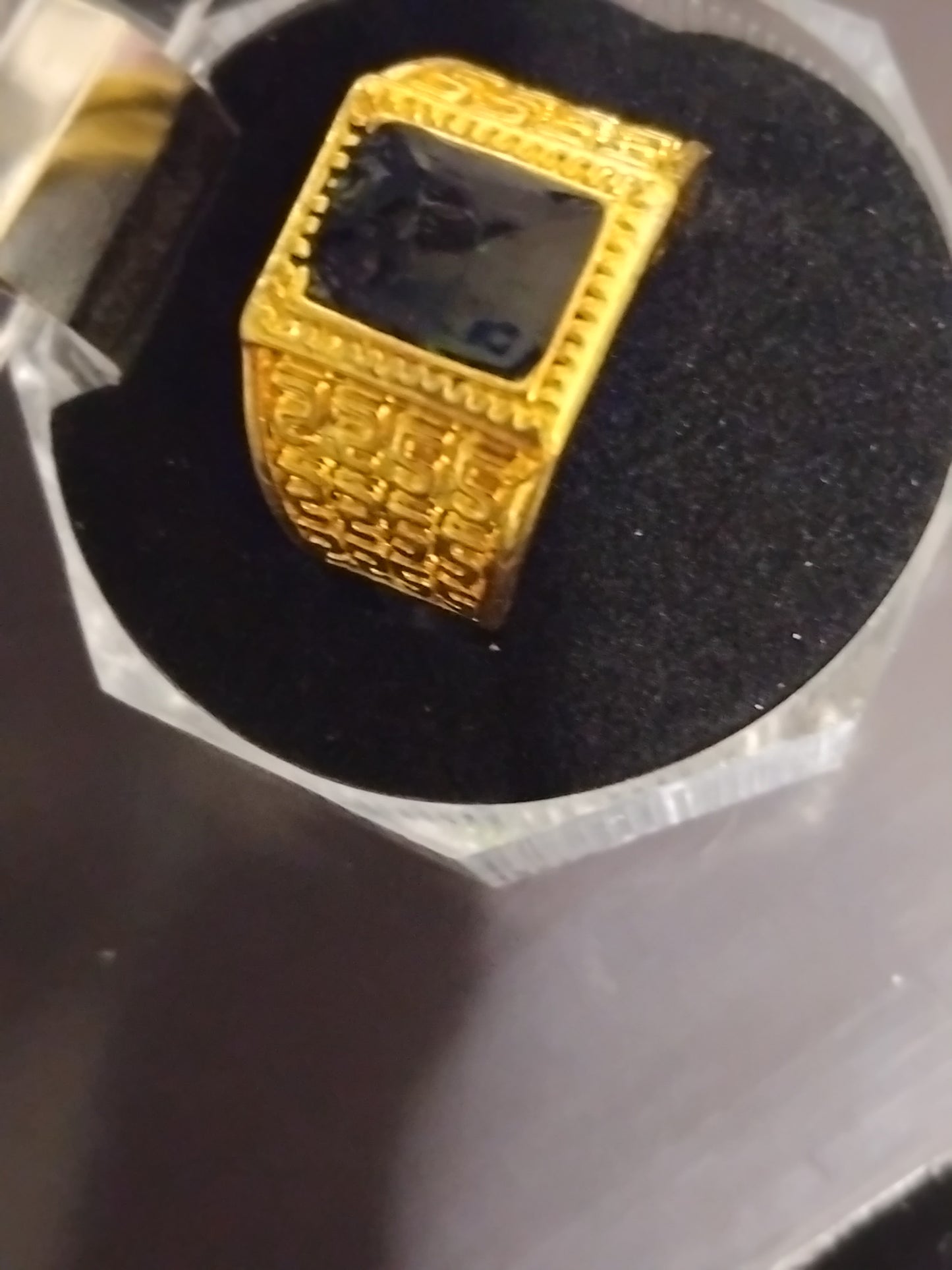 Black and gold centre peace signit rings
