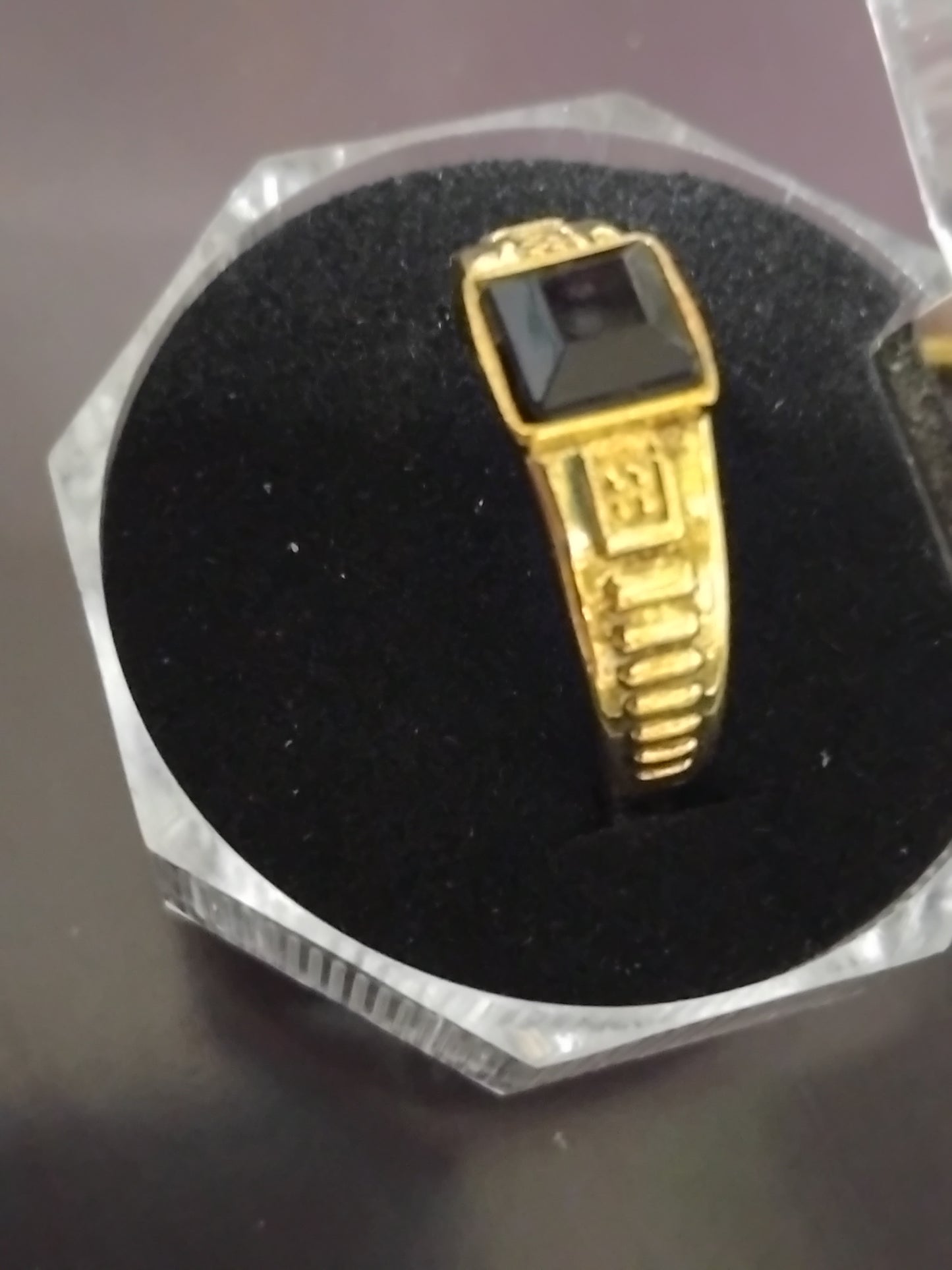 Black and gold centre peace signit rings