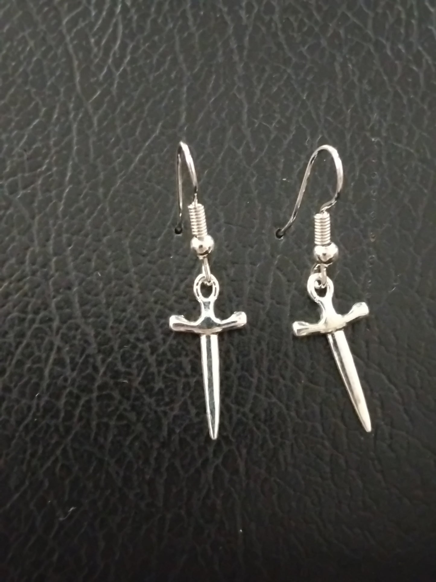 Daggered dangling earrings
