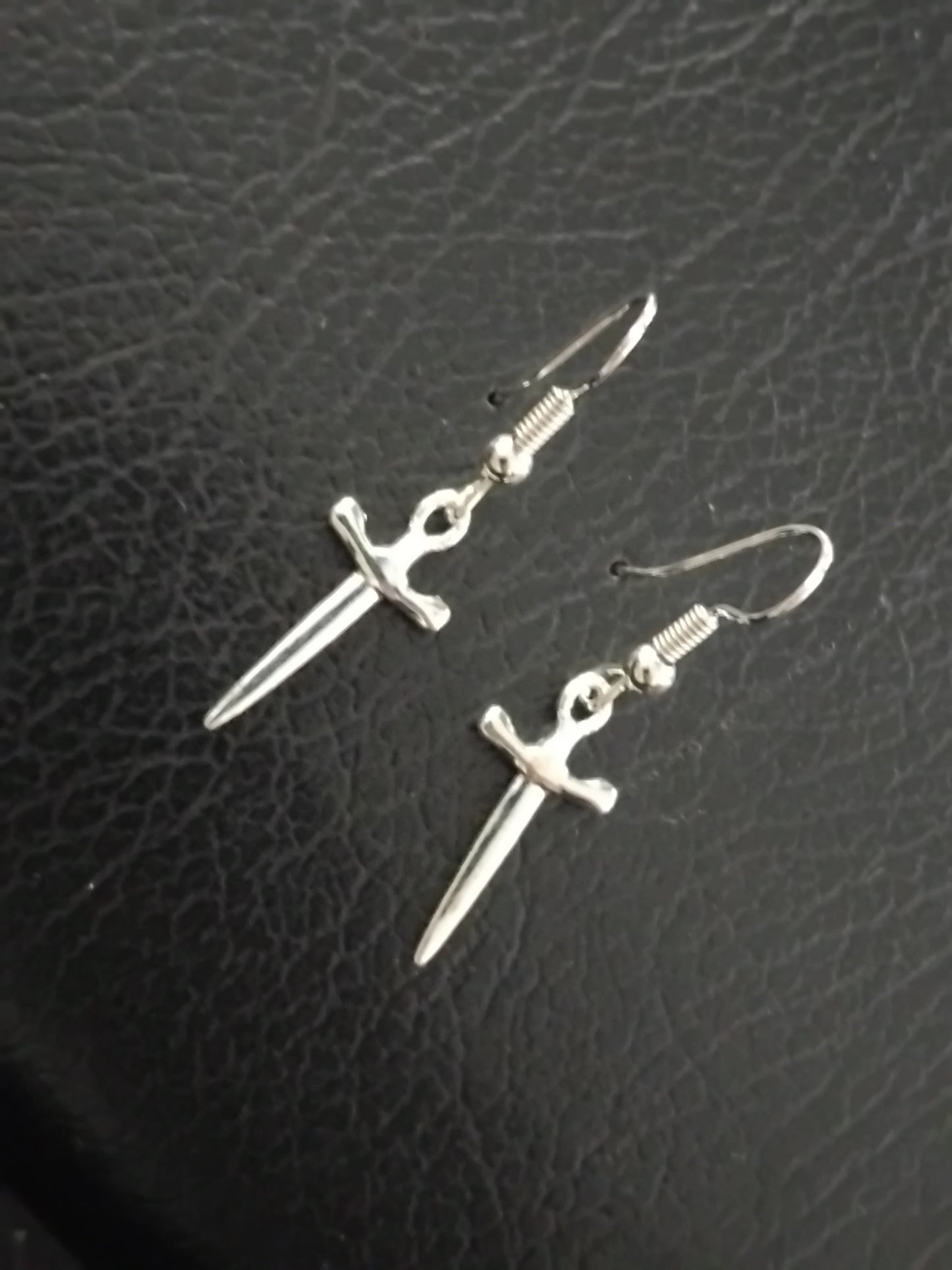 Daggered dangling earrings