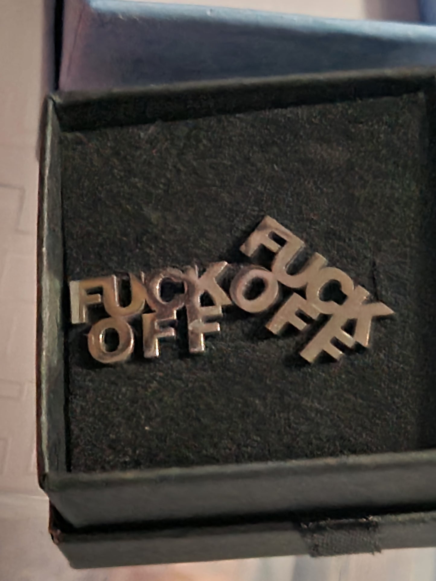 F off earrings