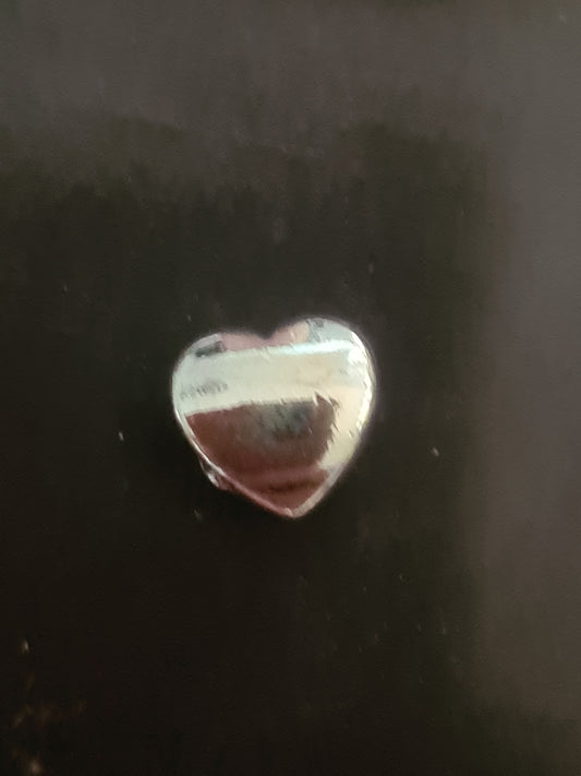 Silver heart charm