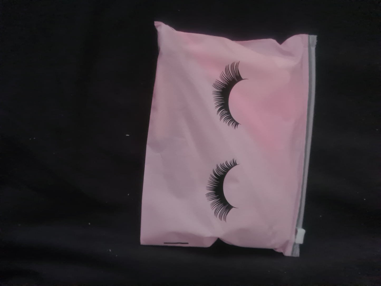 Eyelash zip up make up bag