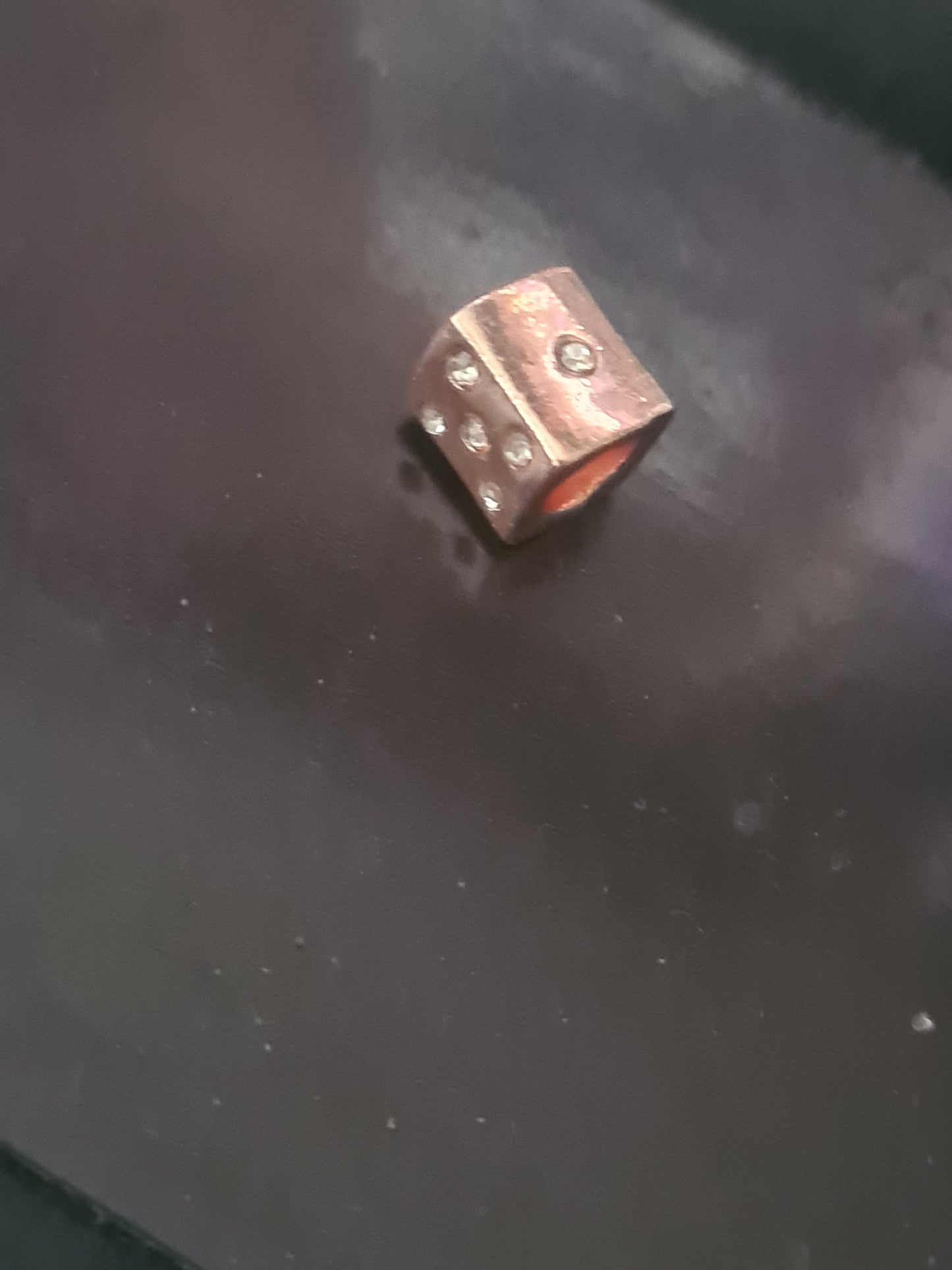 Rose gold dice charm