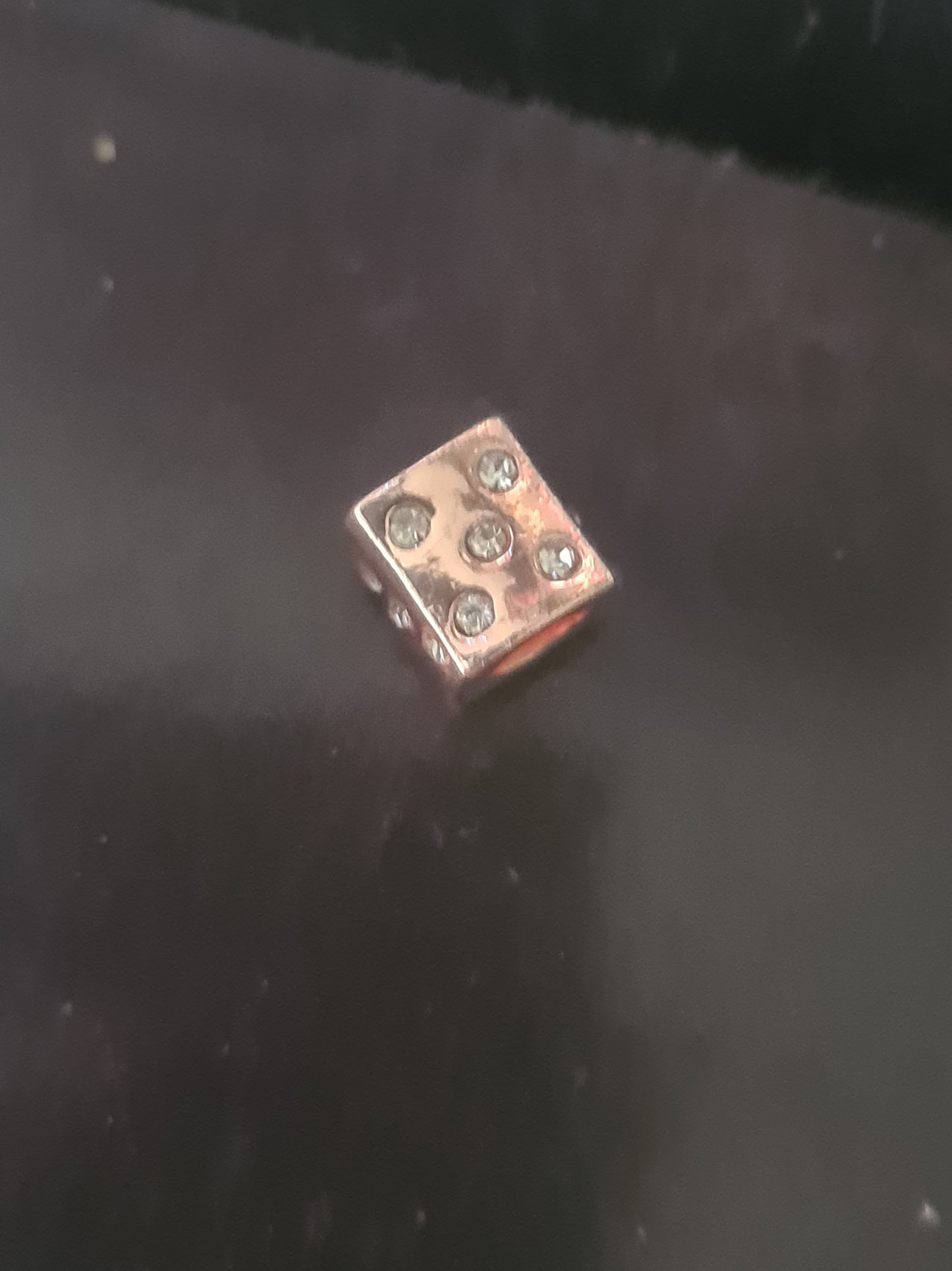 Rose gold dice charm