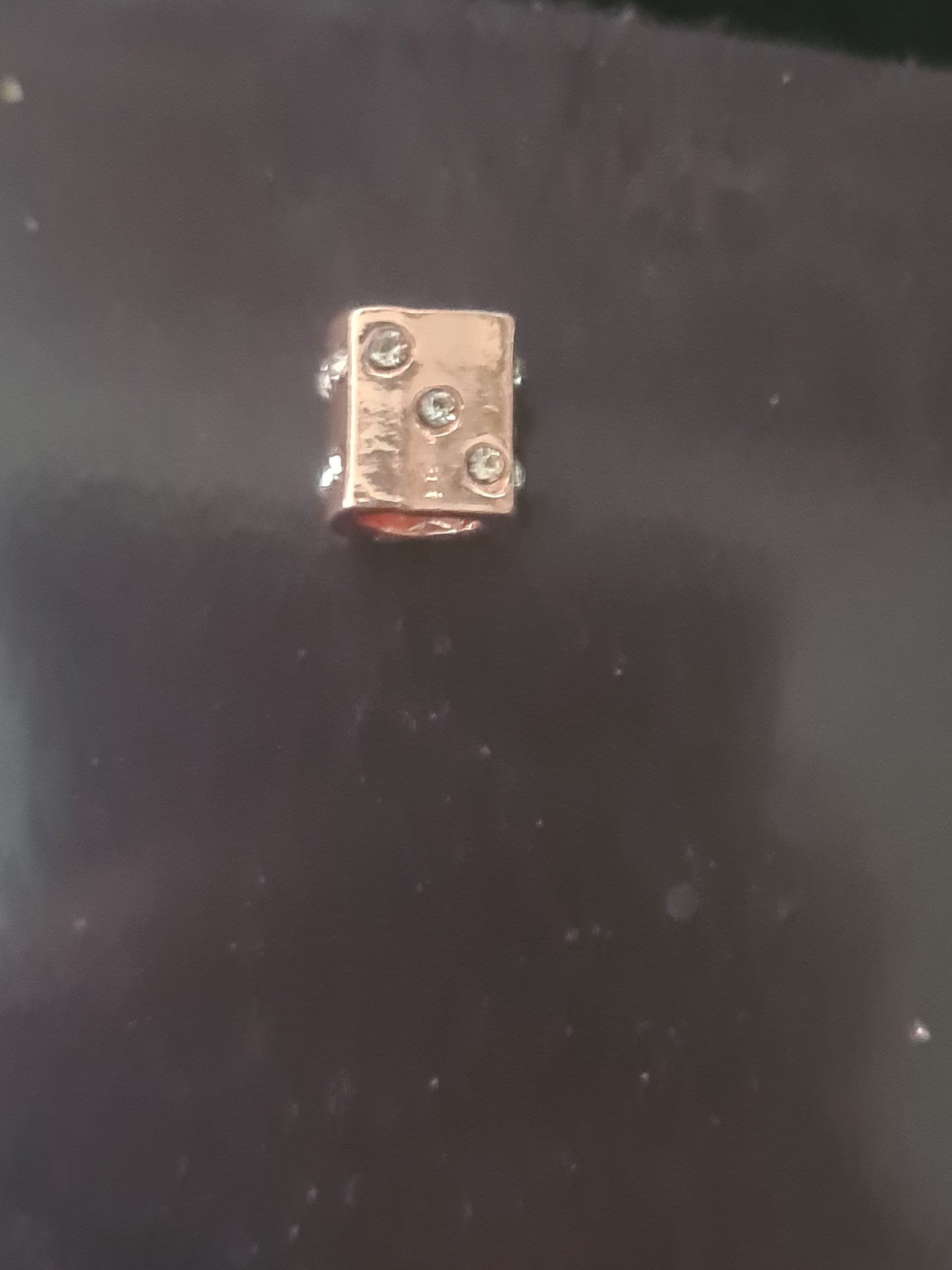 Rose gold dice charm