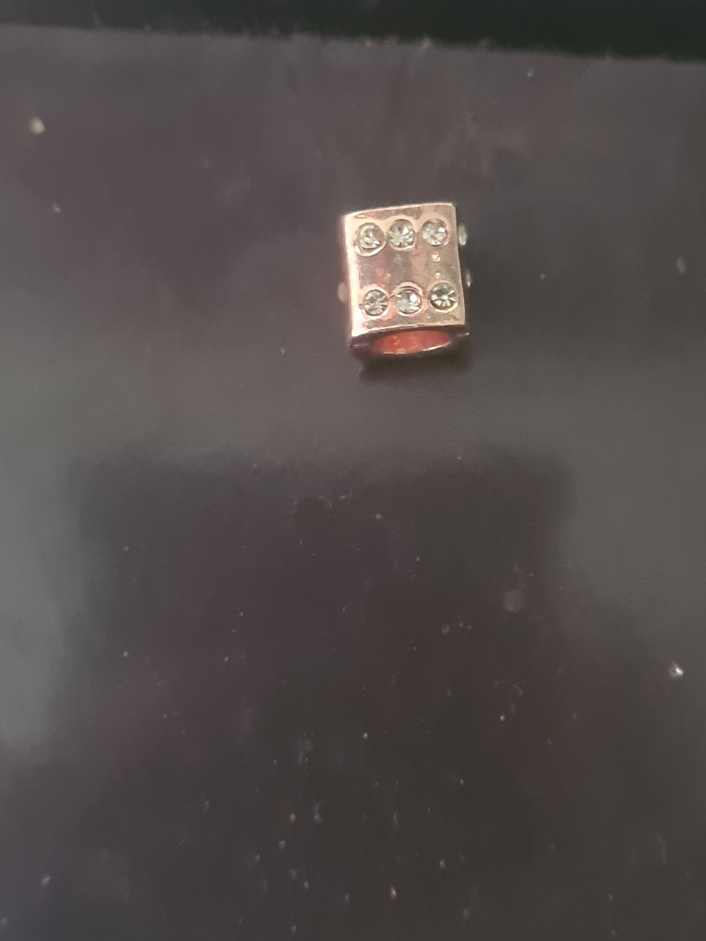 Rose gold dice charm