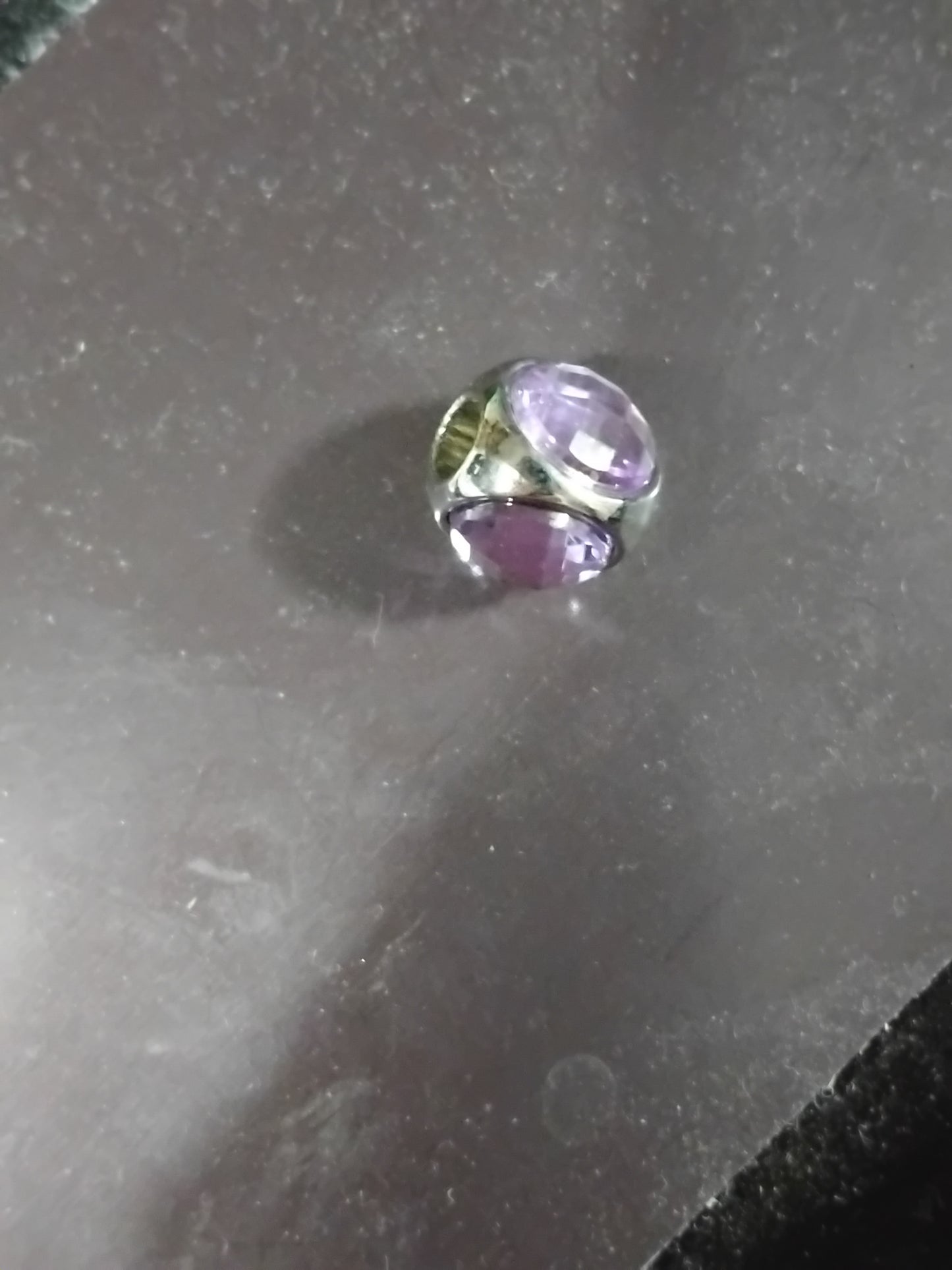 Astronaut helmet charm.