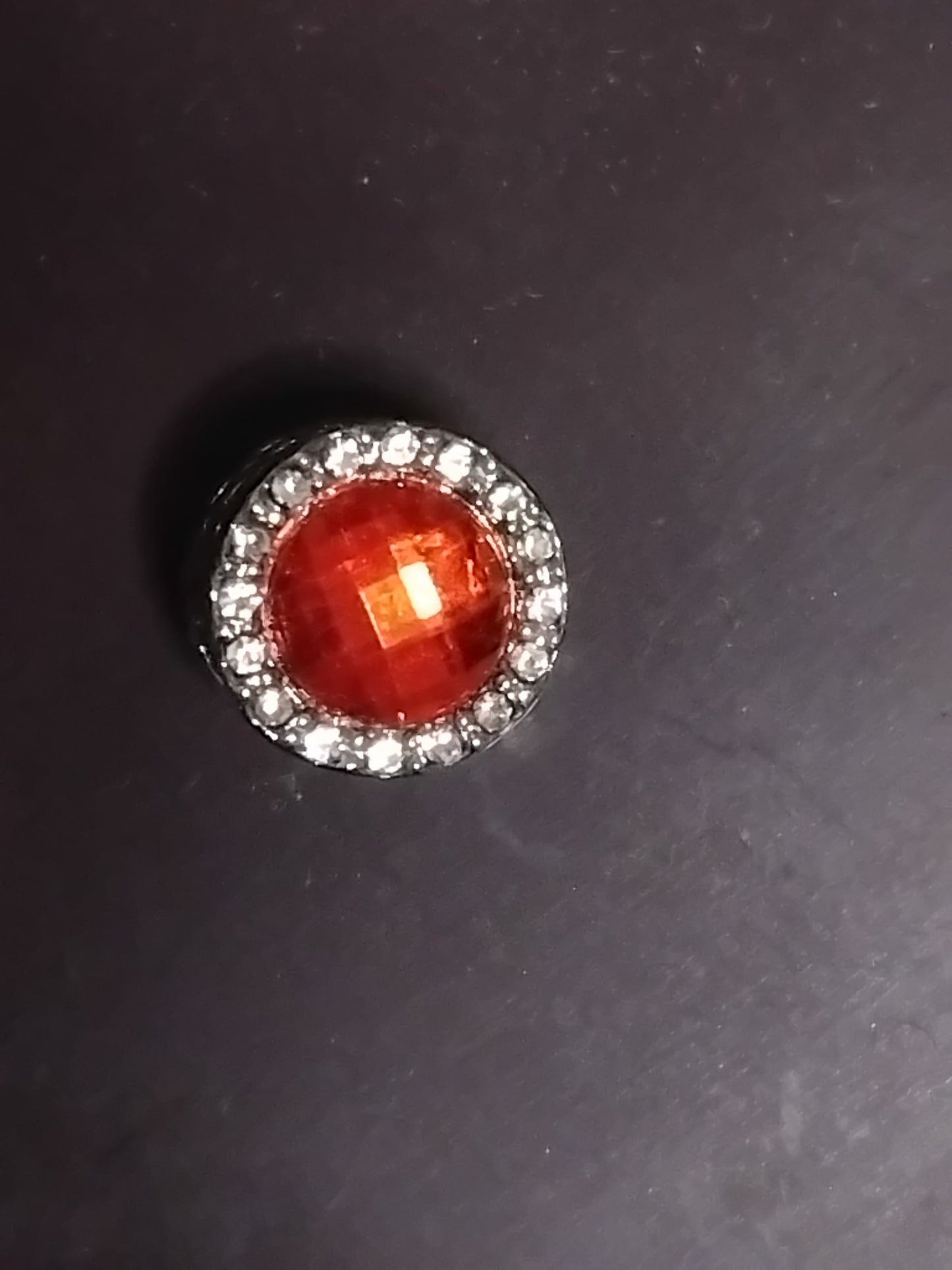 Red gemstone charm