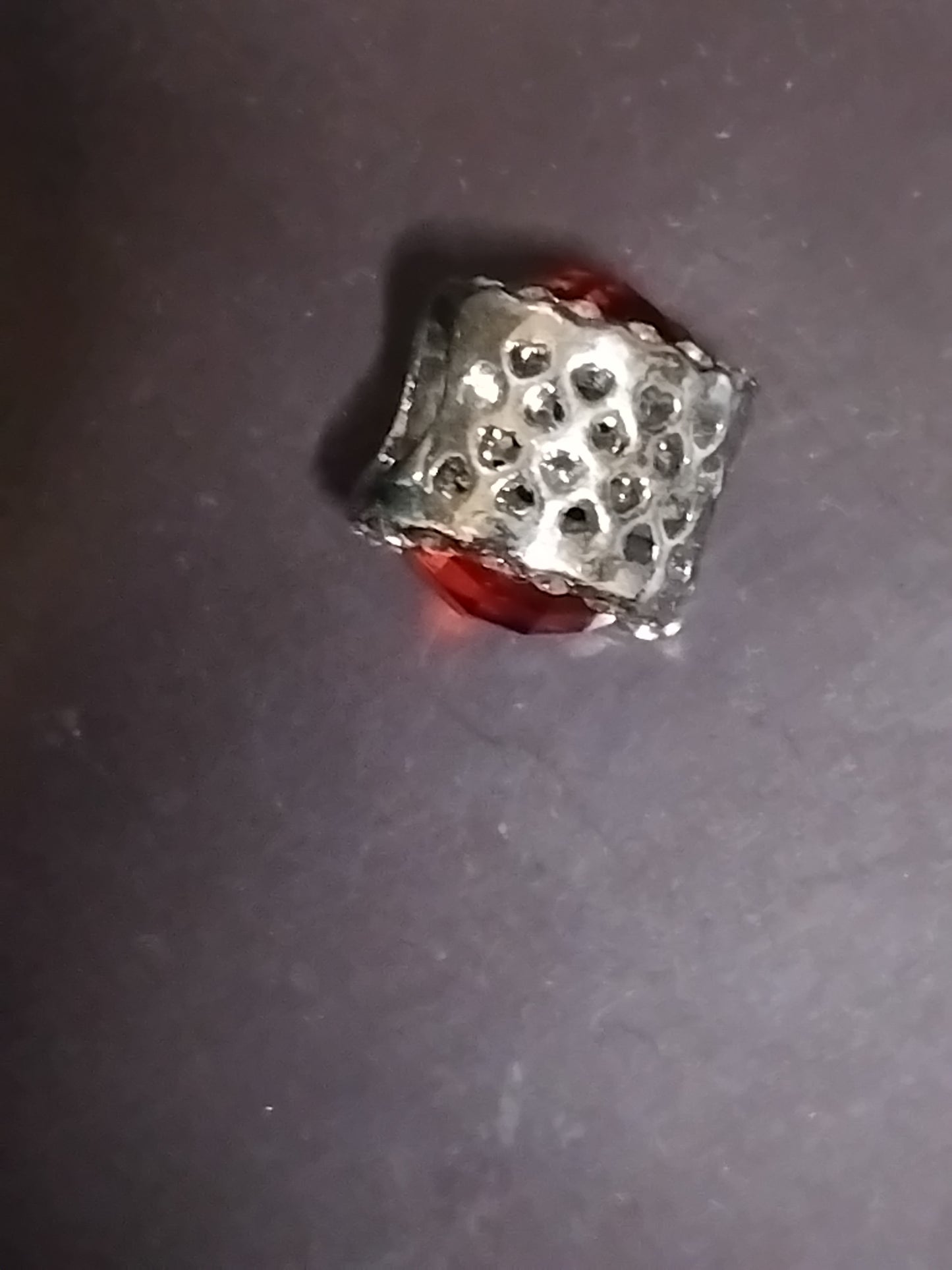 Red gemstone charm