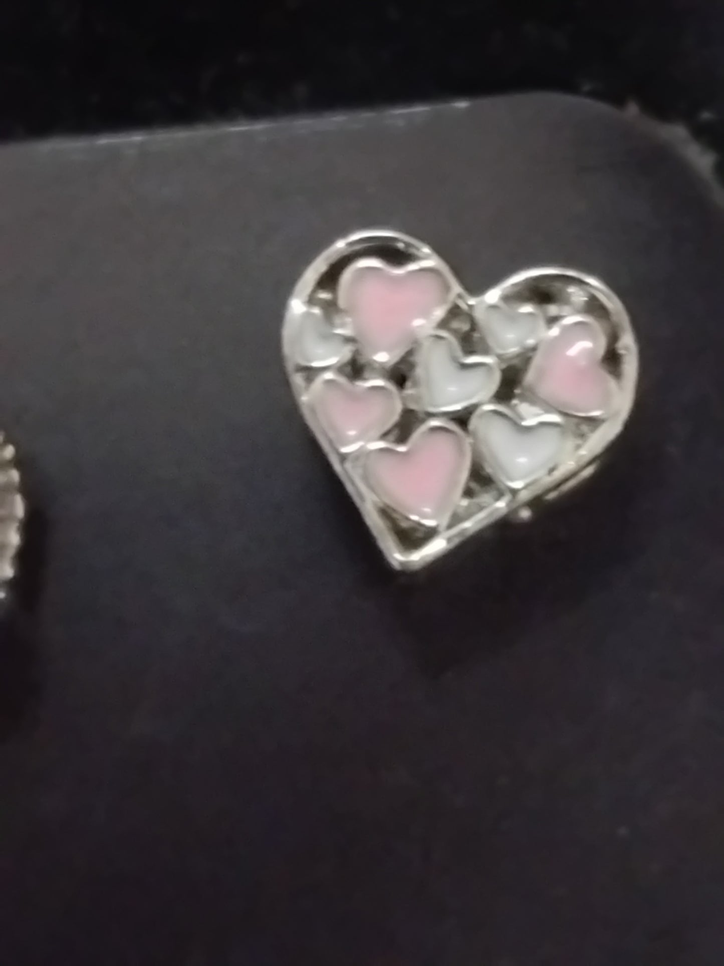 Triple heart charm