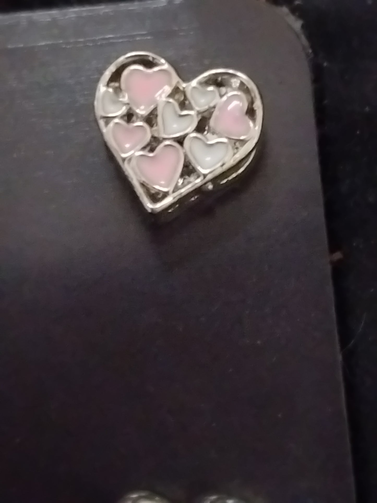 Triple heart charm