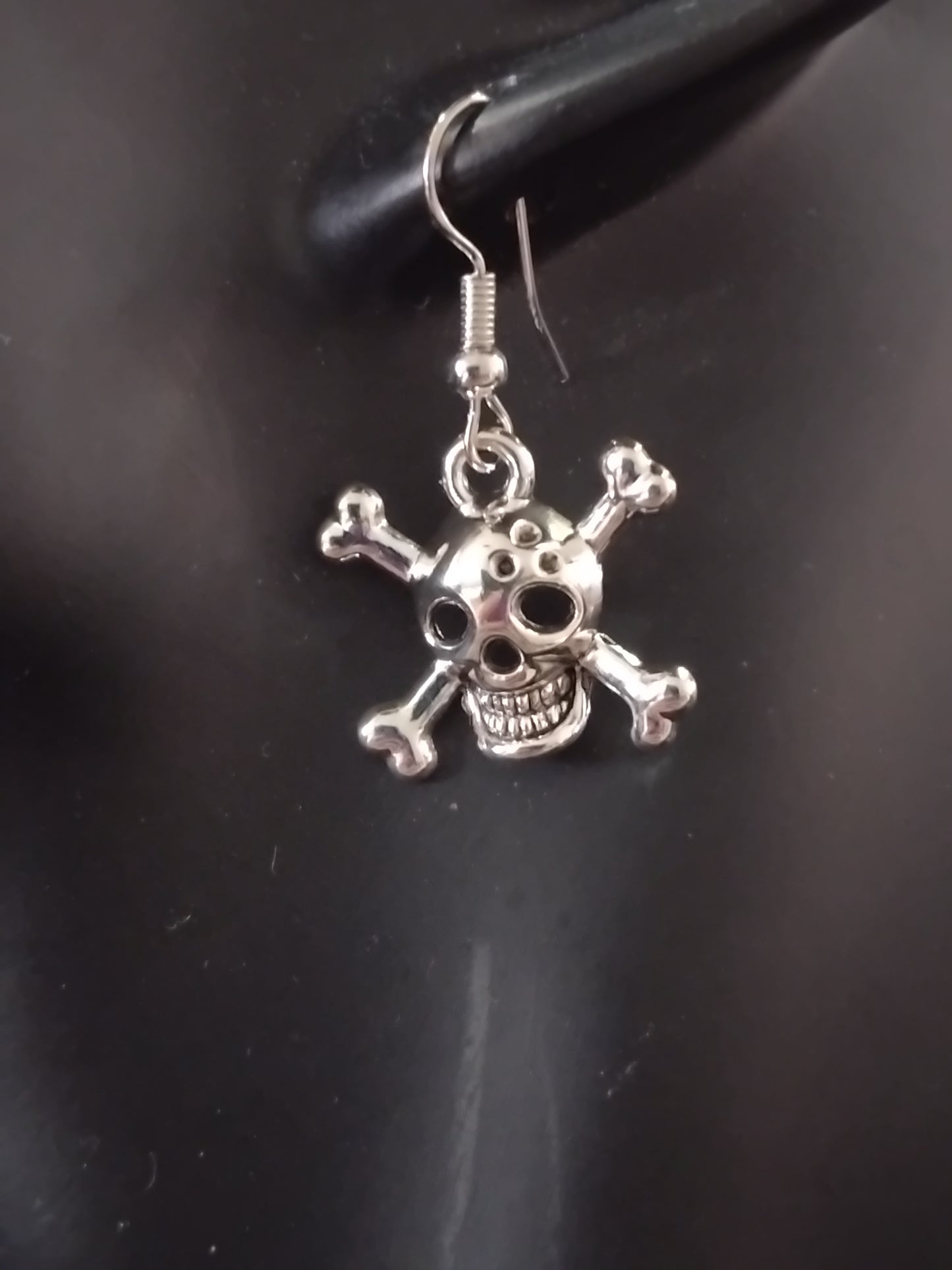 Silver skull earrings