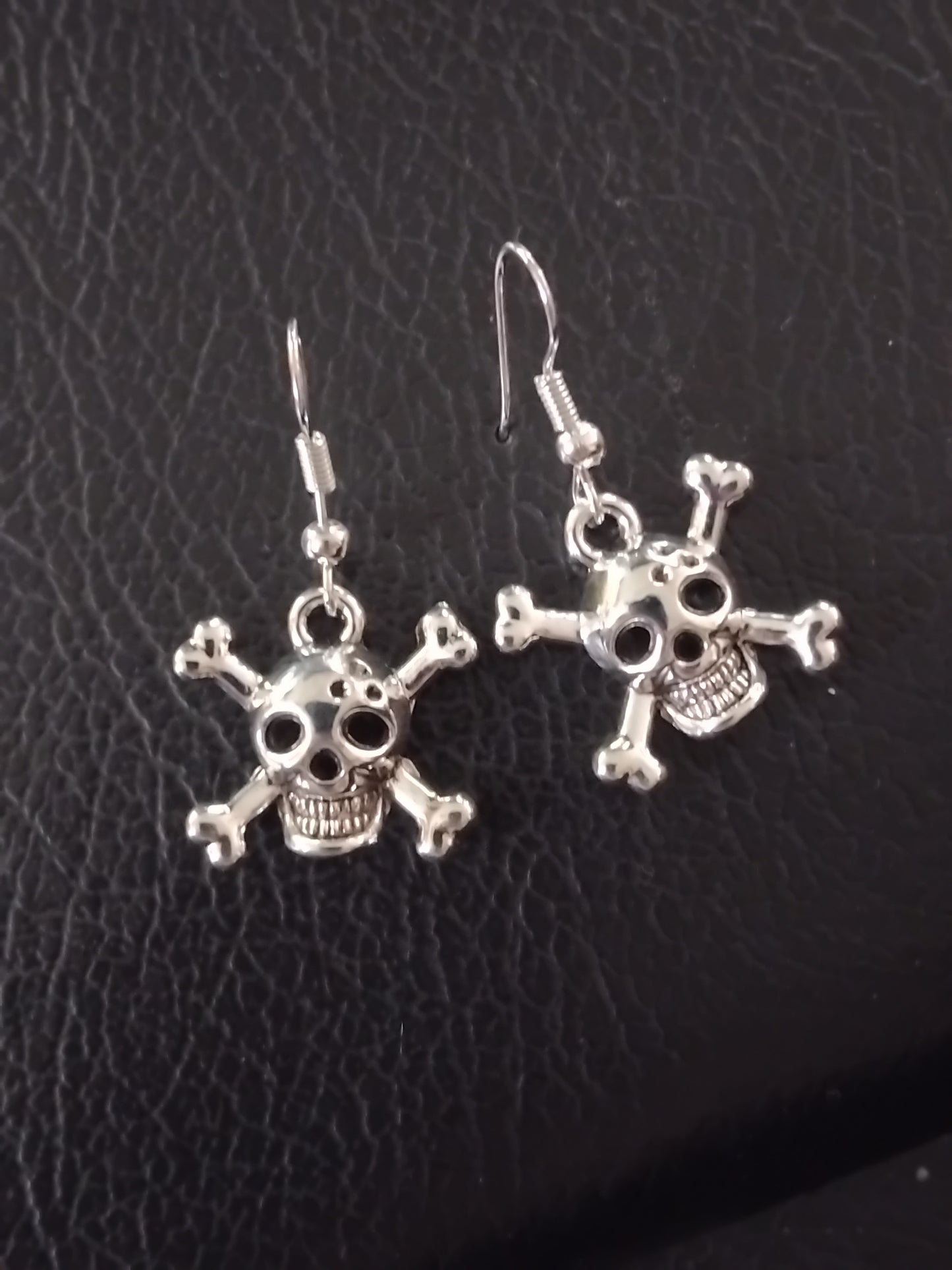 Silver skull earrings