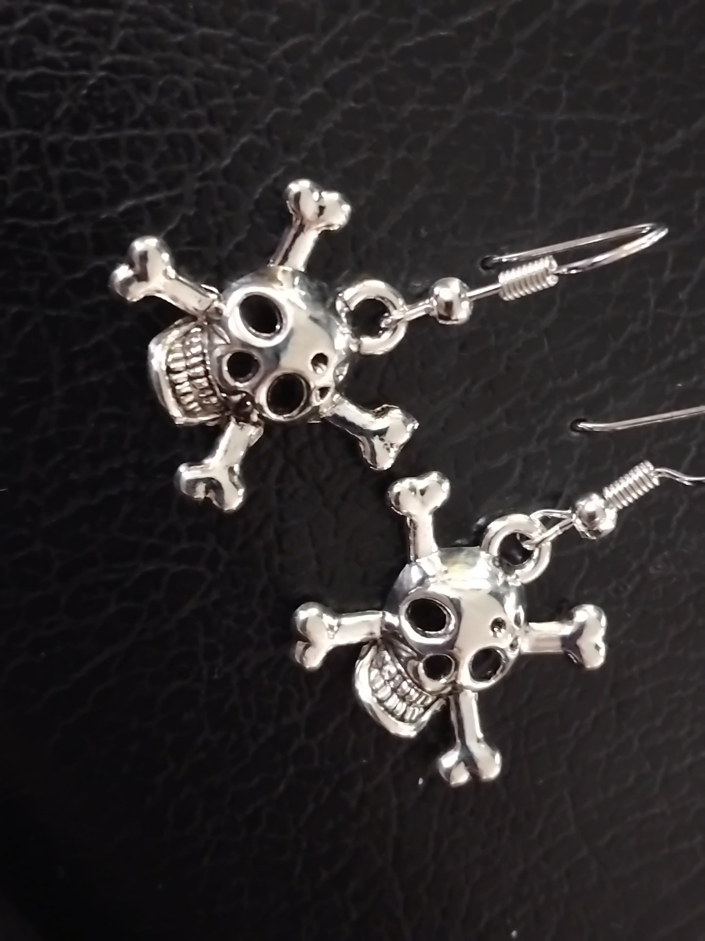 Silver skull earrings