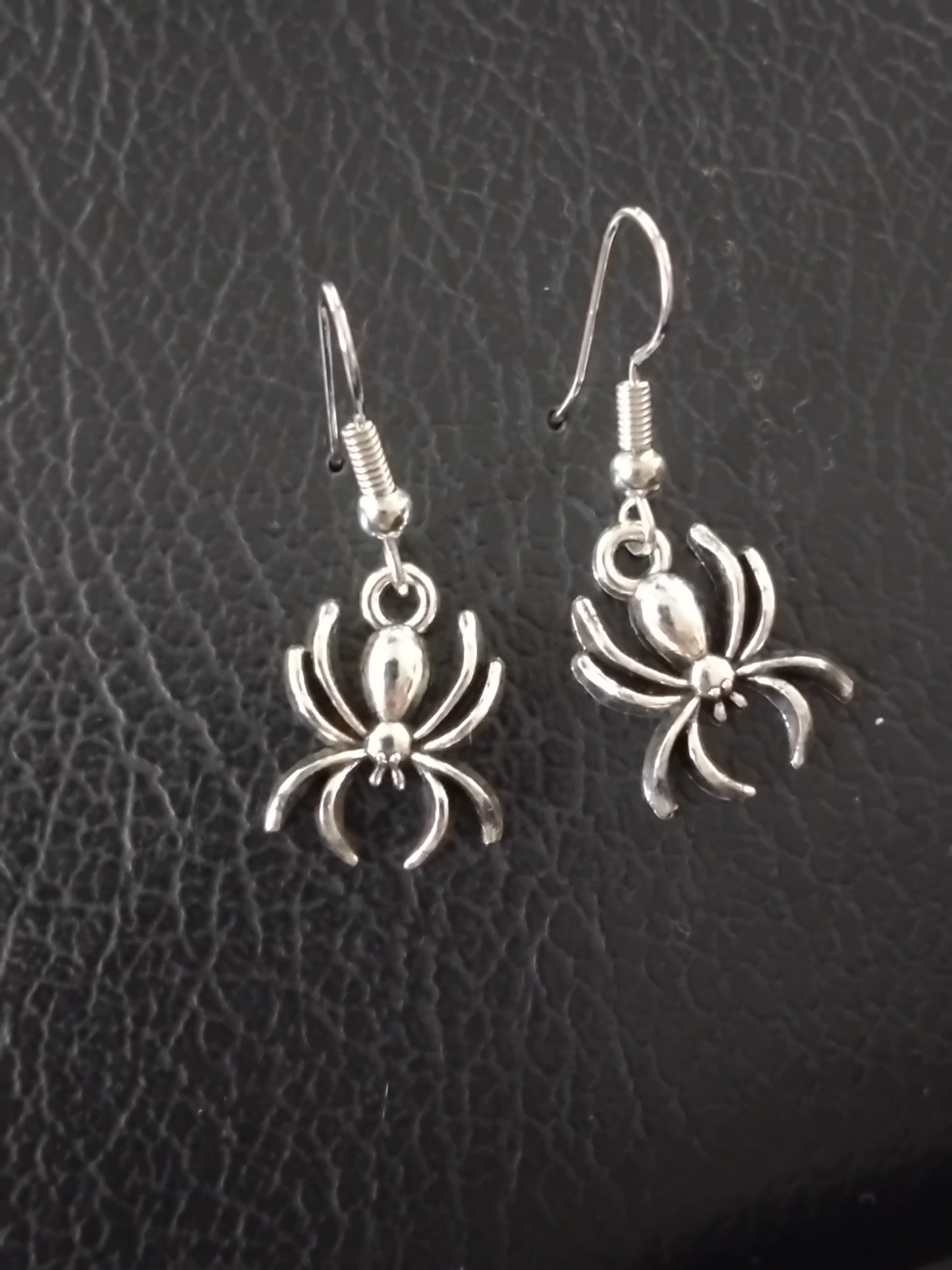 Silver spider earrings