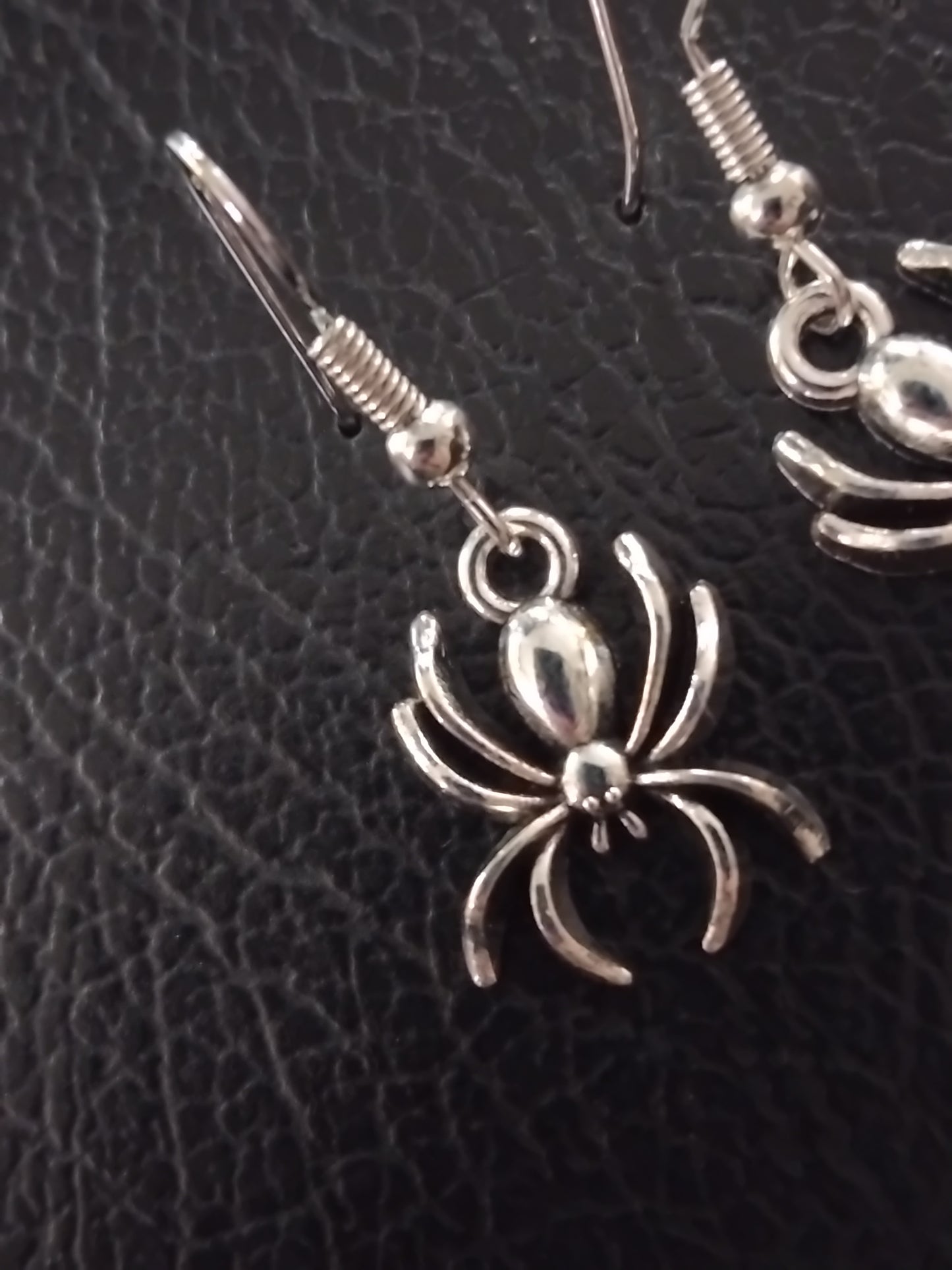 Silver spider earrings