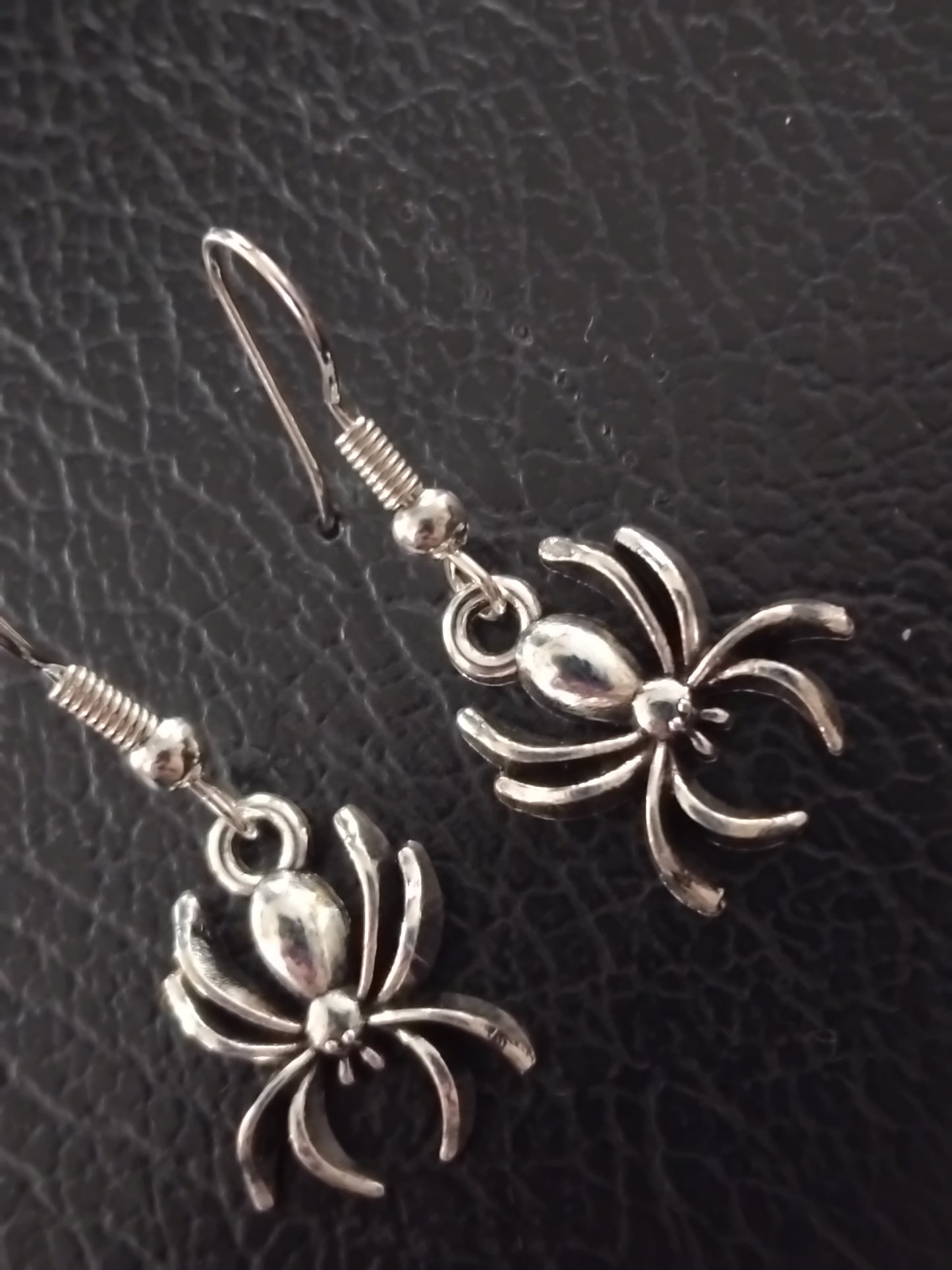 Silver spider earrings