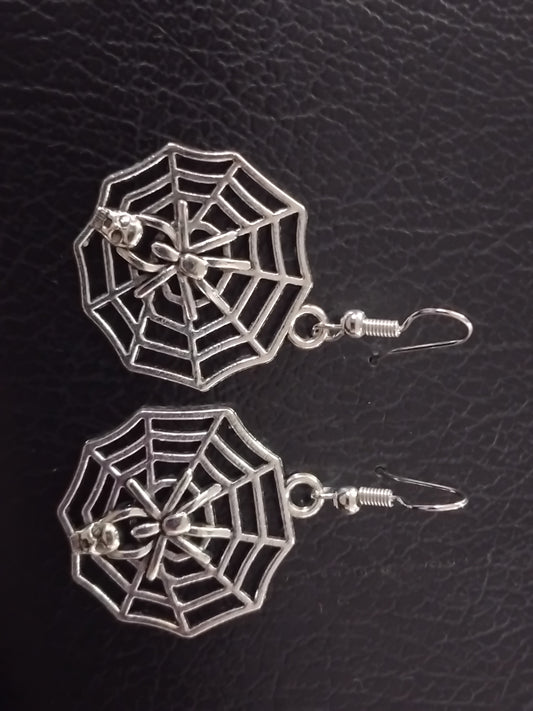 Silver spider web earrings