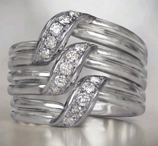 Triple spiral ring