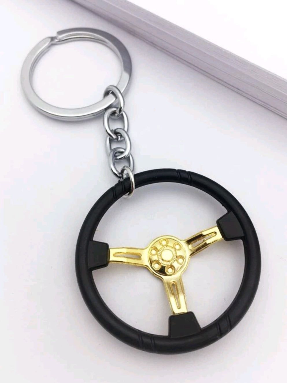 Steering wheel keyring