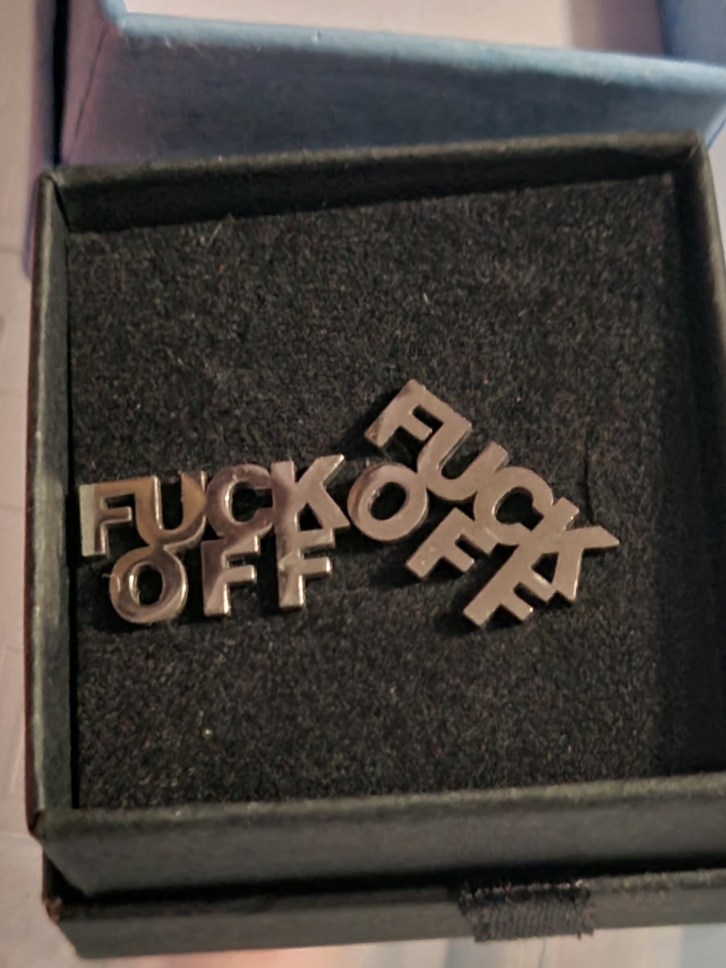 F off earrings